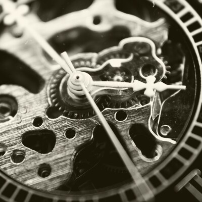 Close-up detail of precision mechanical gears and components in a luxury watch mechanism